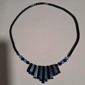 shiny black and blue necklace